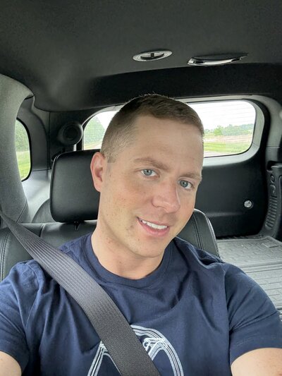 Brandon’s casual selfie in a car before professional dating profile photos, showing a typical low-quality dating app photo