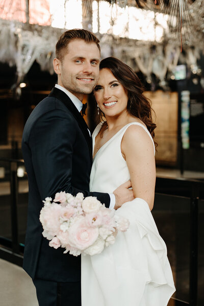 bride-groom-blush-bouquet-tapestry-hall-wedding