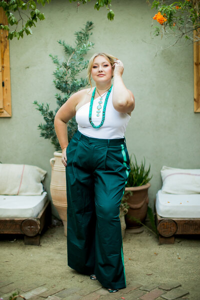 woman posed in a button up