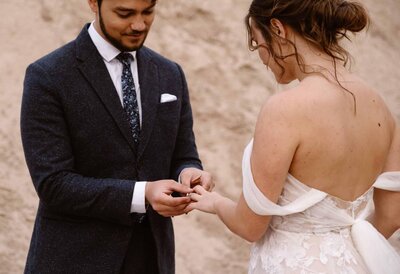 Couple embraces inside of a Anza Borrego slot canyon