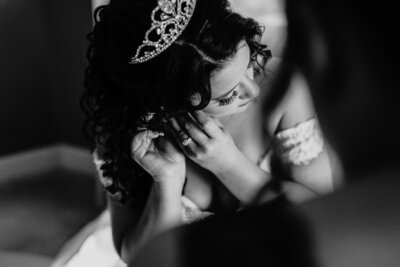 bride touching her earring