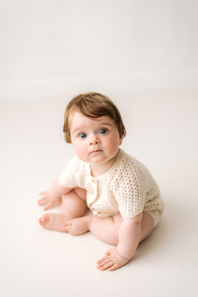 Pregnant mum in a white dress at Billingshurst maternity photoshoot