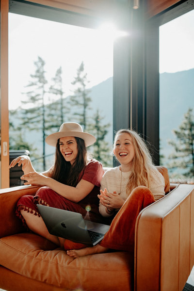 friends smiling in the mountains