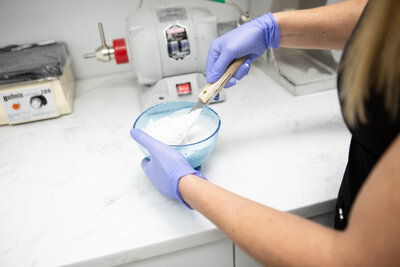 Dental staff working on the process of creating custom dentures at Peak Prosthodontics in Lethbridge, Alberta—ensuring precise fit and comfort.
