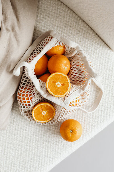 kaboompics_a-few-oranges-in-the-bag-business-card-free-mockup-photos-26127