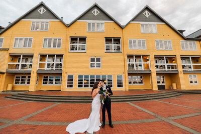rustic Kiana Lodge barn, showcasing, green gardens and blue skies