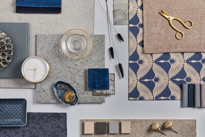 Blue, cream, and gray interior material collage.