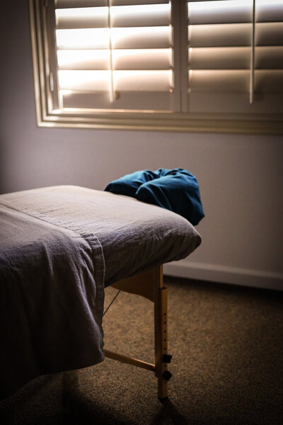 A clean and warm massage table at Healing Haven Massage and Bodywork