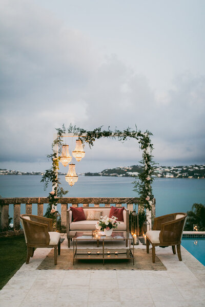 Greenery arch with lounge furniture