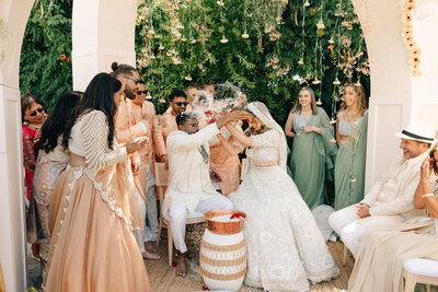 Bride and groom during wedding ceremony planned by Bloom & Blueprint