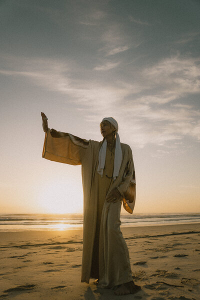 HarJiwan posing at sunset on the beach