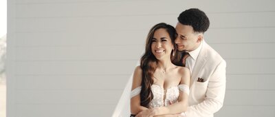 couple laughing and living on the just married feelings in dallas