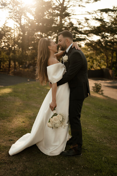Wedding couple embracing at Beaconside House, Bideford