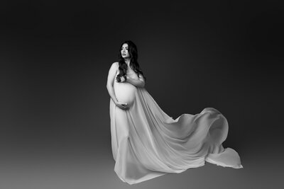black and white studio maternity portrait