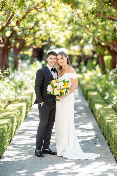 Bride and Groom with their wedding at Rancho Bernardo Inn
