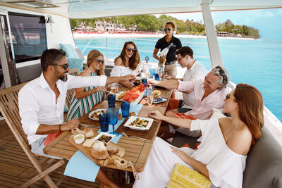 group eating lunch on boat