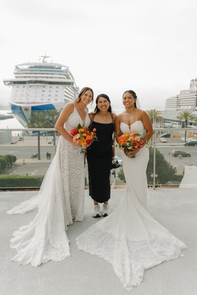 photographer posing with couple