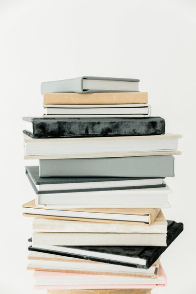 Stack of photo albums from Halleigh Hill Newport Beach Photographer