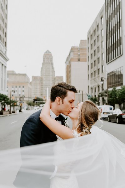 Bride and groom walk up memorial steps at their DC wedding