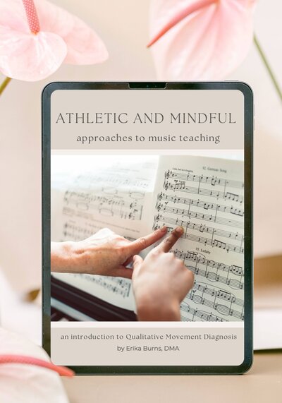 Dr. Erika Burns' free workbook on athletic approaches to music teaching appears on an iPad screen.