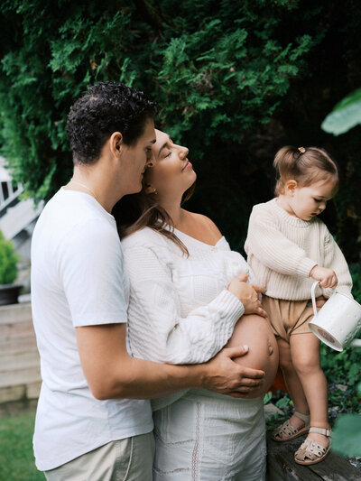 Lesbian couple posing for a portrait at Campbell Valley Park during their maternity session