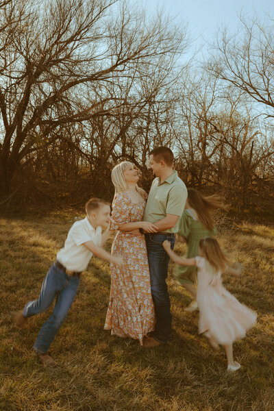 Golden hour family session in a field in Abilene, TX