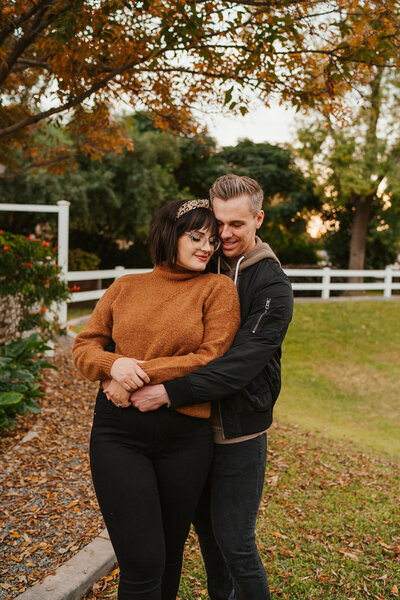 couple embracing in back yard