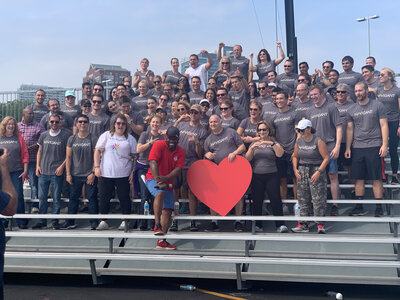 photo of people wearing grey shirt.