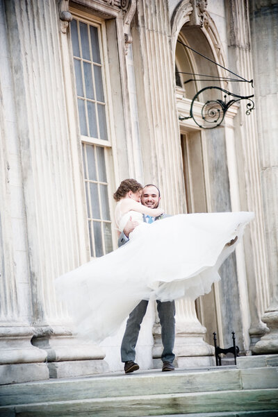 Groom Carrying Bride Old City Philadelphia - Annie Hosfeld Photography