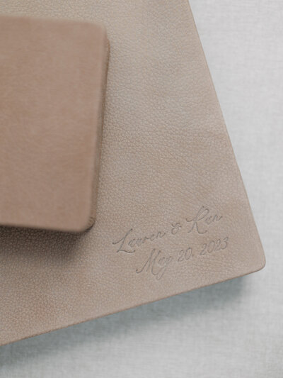 closeup of leather fine art heirloom albums designed by Shalae Byrd