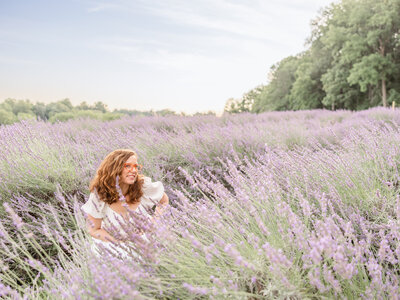 portrait of woman admiring lavender field