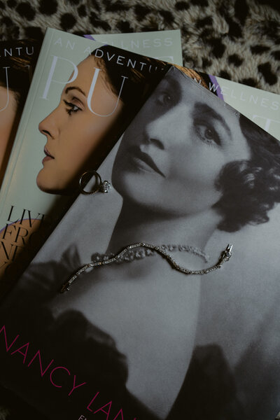 Wedding details shot by Dariia Noa. Depicting Jimmy Choo shoes, Byredo perfume, golden earings and a diamond ring.