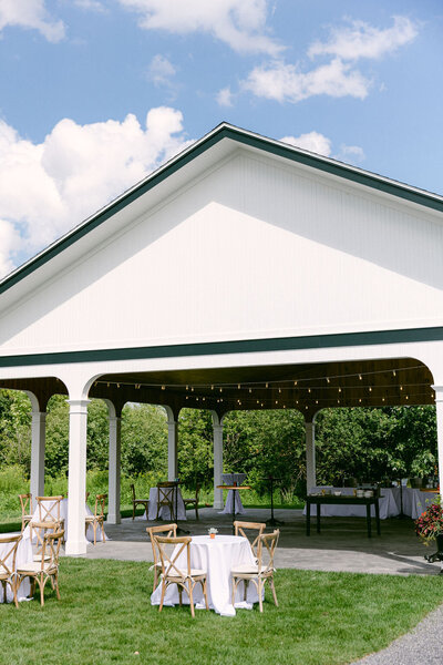 white event pavilion ready for cocktail hour at Windridge Estate in Upstate New York