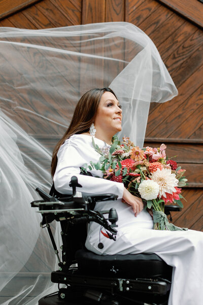 Bride holding champagne flute