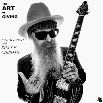 Billy F Gibbons black and white portrait The ART of GIVING instagram feed holding guitar while gesturing toward camera