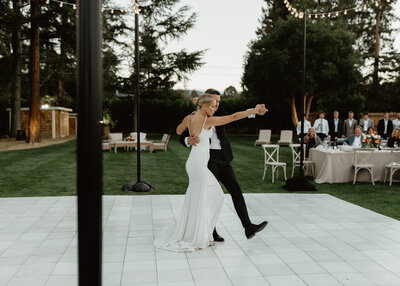 bride and groom dancing