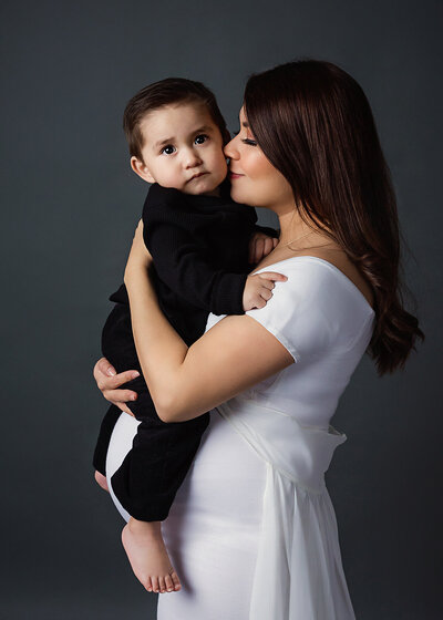 studio maternity with pink fluffy flowy dress