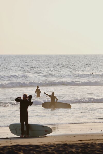 The beach below Polhawn fort, popular with surfers.