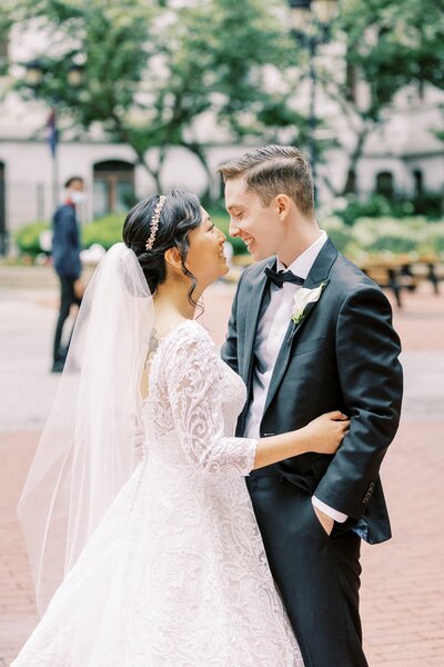Bride and groom embracing
