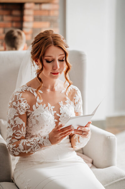 Bride reading her vows to her groom and tears are rolling down her face
