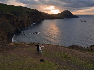 couple standing near ocean
