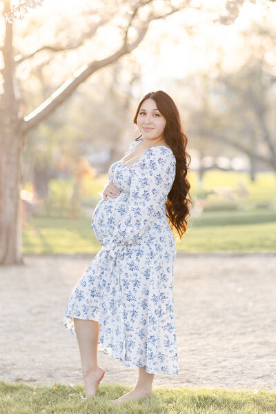 A maternity photographer captures pregnant mother with her son