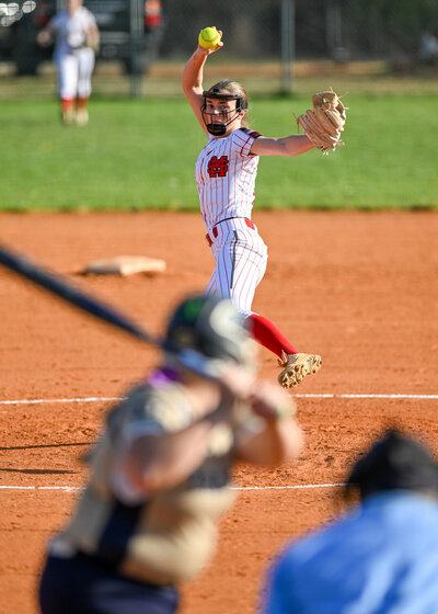 a signal mountain softball player pitches in a high school game photo