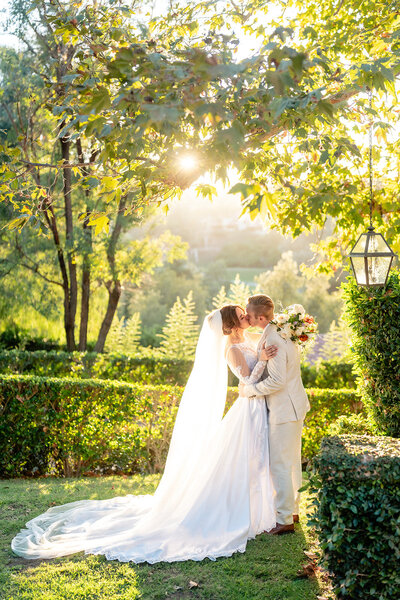 Bride and Groom standing together at their wedding at Rancho Bernardo Inn