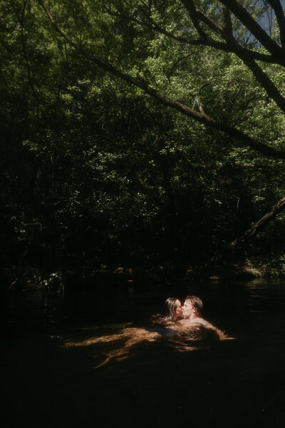 wedding cake with ring stuck into it