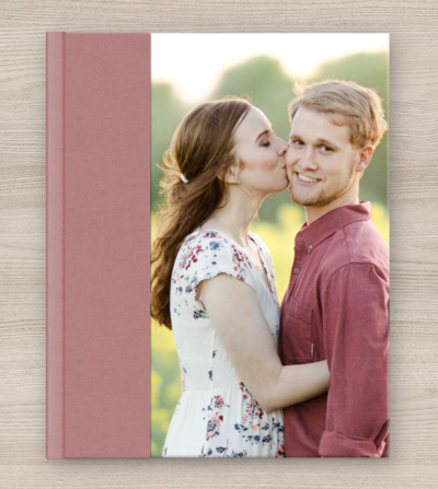 Combo album cover in dusty pink featuring a woman kissing a man's cheek.