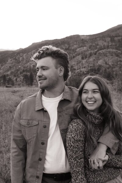 black and white couples photos which is arm around her