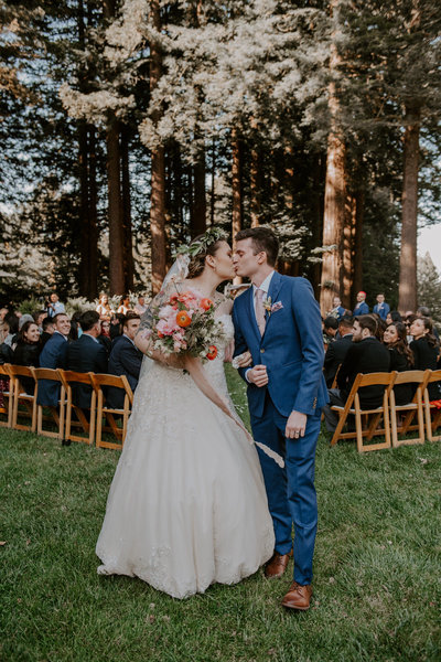 bride and groom kissing