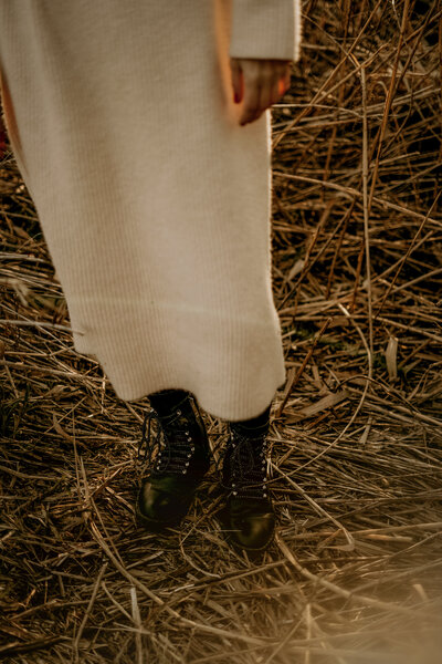 black shoes and a beige dress