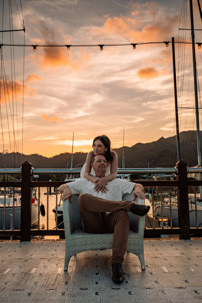 A joyful wedding scene in Ravenshoe, featuring a couple surrounded by colourful confetti, capturing a moment of celebration.